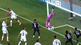 Paraguay goalkeeper Orlando Gill (12) fails to save a goal that was disallowed by Germany's Jonathan Tah (4) as Paraguay's Antonio Sanabria (9) looks on during the World Cup round of 32 soccer match between Germany and Paraguay in Foxborough, Mass., near Boston, Monday, June 29, 2026. (AP Photo/Mark Stockwell)