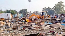 Surat civic officials suspended, Surat civic officials suspended ROW OVER DEMOLITION OF SHANTIES, ROW OVER DEMOLITION OF SHANTIES, DEMOLITION OF SHANTIES, Ahmedabad news, Gujarat news, Indian express, current affairs