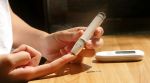 Woman recovering after hysterectomy monitoring blood sugar