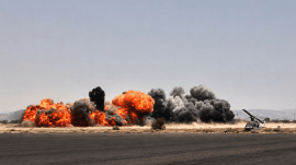 This image taken from video broadcast by Al-Masirah TV, a Houthi-controlled news channel, shows an explosion at the Sanaa International Airport compound in Yemen on July 13, 2026. (AP)