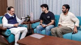 Union Minister JP Nadda, left, meets Cockroach Janta Party (CJP) spokespersons Saurav Das and Ashutosh Ranka amid an ongoing protest by CJP over the alleged NEET paper leak, in New Delhi. (@JPNadda/X via PTI Photo)