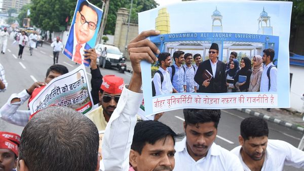 Samajwadi Party Youth wing workers hold a protest against state government on Mohammad Ali Jauhar University, demolition order, in front of state assembly in Lucknow on Monday. (Express Photo by Vishal Srivastav)