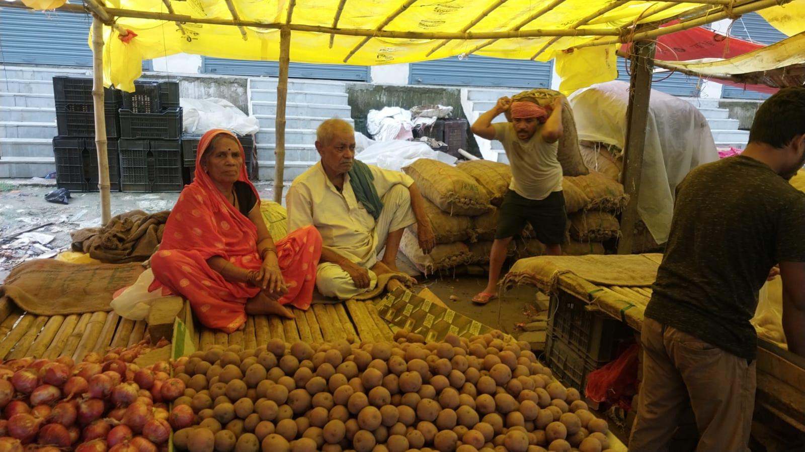 Jhandu Kumar's father Ramanand Paswan and Kamla Devi at their vegetable shop in Nalanda.