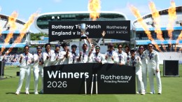 India players celebrate with the trophy following the victory in the test match during day four of the first Women's Rothesay Test cricket match between England and India in London, England, Monday, July 13, 2026. (Steven Paston/PA via AP)