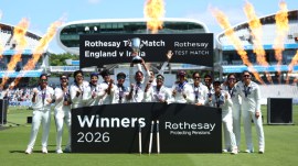 India players celebrate with the trophy following the victory in the test match during day four of the first Women's Rothesay Test cricket match between England and India in London, England, Monday, July 13, 2026. (Steven Paston/PA via AP)