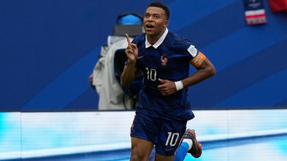 France's Kylian Mbappe (10) celebrates scoring his side's third goal during the World Cup third-place playoff soccer match between France and England in Miami Gardens, Fla., Saturday, July 18, 2026. (AP Photo/Lynne Sladky)