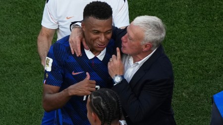 France's Kylian Mbappe, left, and France head coach Didier Deschamps celebrate after the World Cup round of 16 soccer match against Paraguay in Philadelphia on Saturday, July 4, 2026. (AP Photo/Matt Rourke)