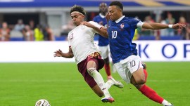 Spain's Lamine Yamal defending the ball from France's Kylian Mbappe with all this might. (AP)