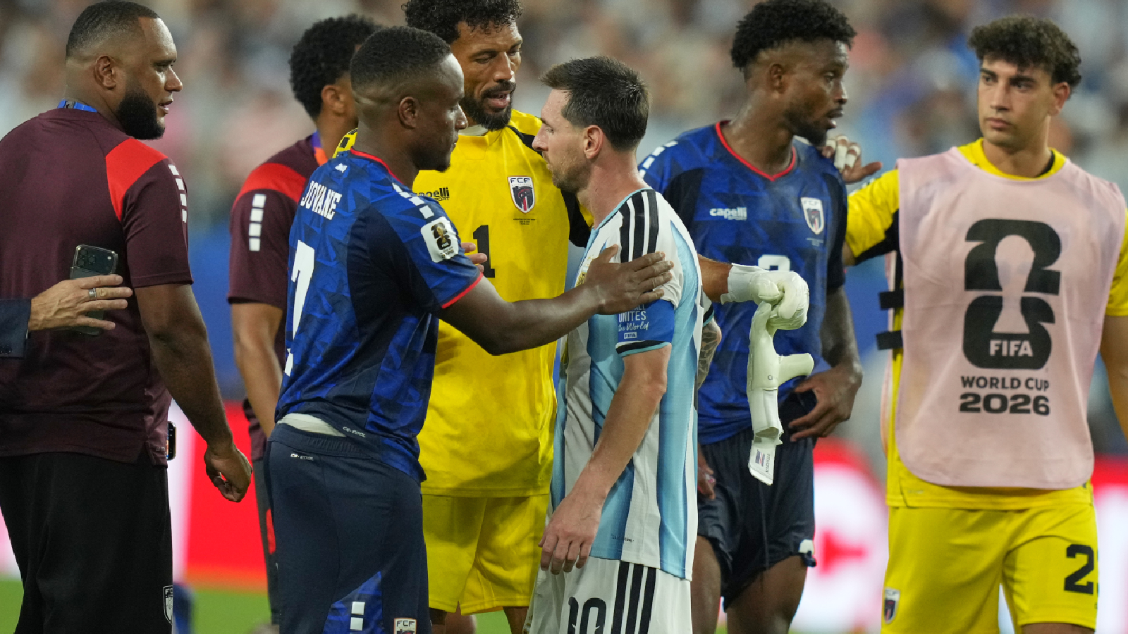 Cape Verde goalkeeper Vozinha (1), center, greets Argentina's Lionel Messi (10) after the World Cup round of 32 soccer match between Argentina and Cape Verde in Miami Gardens, Fla., Friday, July 3, 2026. (AP Photo/Lynne Sladky)