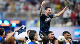 Argentina's Lionel Messi celebrates with his teammates at the end of the World Cup semifinal soccer match between England and Argentina in Atlanta, Wednesday, July 15, 2026. (AP Photo/Rebecca Blackwell)