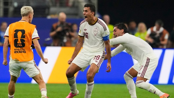 Ferran Torres (7) and Rodri (16) celebrate after Mikel Merino's (6) goal during the World Cup round of 16 match between Portugal and Spain. (AP)