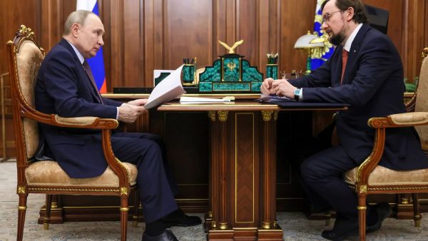 A photograph provided by Russian state media of President Vladimir V. Putin with Aleksei Repik, founder of R-Pharm, a Moscow pharmaceutical company, at the Kremlin in 2025.