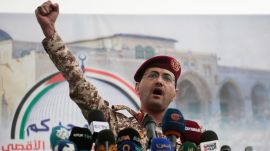 Houthi military spokesman Yahya Saree speaks at a rally against the US and Israel in Sanaa, Yemen, April 18, 2025. (AP Photo