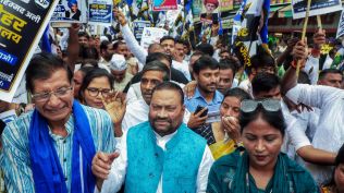 Apni Janta party (AJP) president Swami Prasad Maurya with his supporters during a protest march against the demolition notice, in Lucknow. ANI