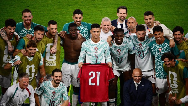 Portugal team with Diogo Jota's jersey as a tribute after win vs Croatia. (AP)