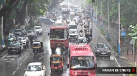 Pune city experienced heavy rainfall throughout the day, causing the water level in the Mutha Riverbed to rise. (Express Photo By Pavan Khengre)