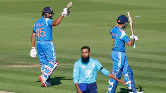 Rohit Sharma of India raises his bat after scoring a hundred during the 3rd ODI International match between England and India at the Lord's Cricket Ground, London, England on July 19, 2026.