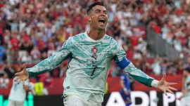 Portugal's Cristiano Ronaldo (7) celebrates after scoring their opening goal during the World Cup round of 32 soccer match between Portugal and Croatia in Toronto, Thursday, July 2, 2026. (AP Photo/Stephanie Scarbrough)