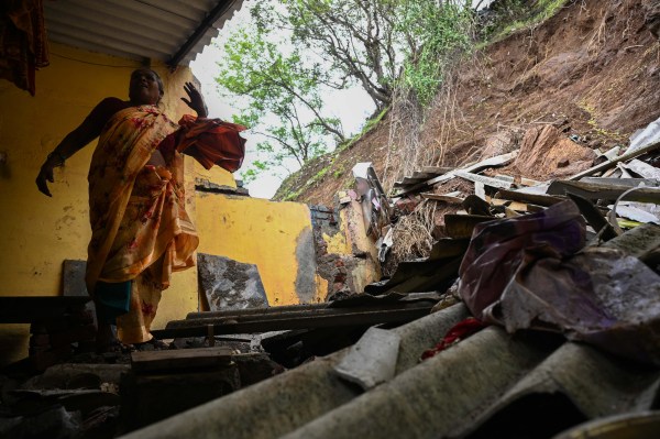 Pushpa Yadav, whose house collapsed due to a landslide, shows her house situated on the slope of a hillock at Vikhroli Parksite area in Mumbai on 09 July 2026. The area has been marked as a landslide-prone zone by the authorities. Express photo by Sankhadeep Banerjee. 09.07.2026.