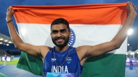 Sarvesh Anil Kushare, of India, poses after winning the silver medal in the men's high jump final at the Commonwealth Games in Glasgow, Scotland, Monday, July 27, 2026. (AP Photo/Alastair Grant)