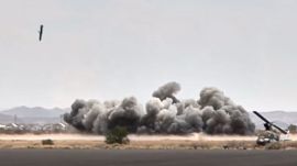 This image taken from video broadcast by Al-Masirah TV, a Houthi-controlled news channel, shows a projectile striking the Sanaa International Airport compound during what the Iranian-backed Houthi rebels in Yemen said were several Saudi airstrikes in Sanaa, Yemen, Monday, July 13, 2026.