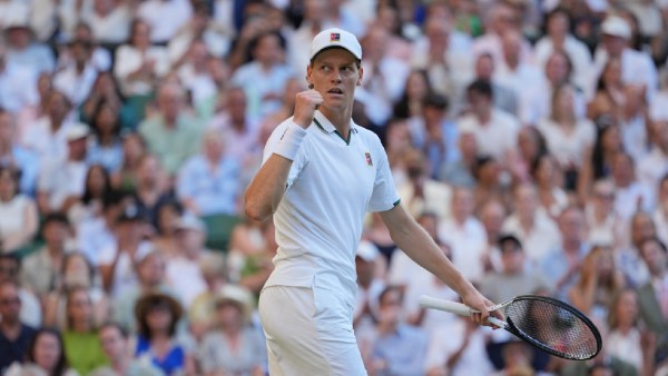 Jannik Sinner of Italy celebrates after winning a point against Alexander Zverev of Germany men's singles final at Wimbledon Tennis Championships in London, Sunday, July 12, 2026. (AP Photo/Kin Cheung)