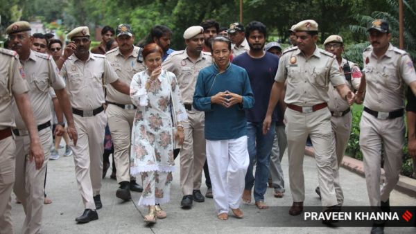 Sonam Wangchuk with his wife at Rajghat in New Delhi on Monday.