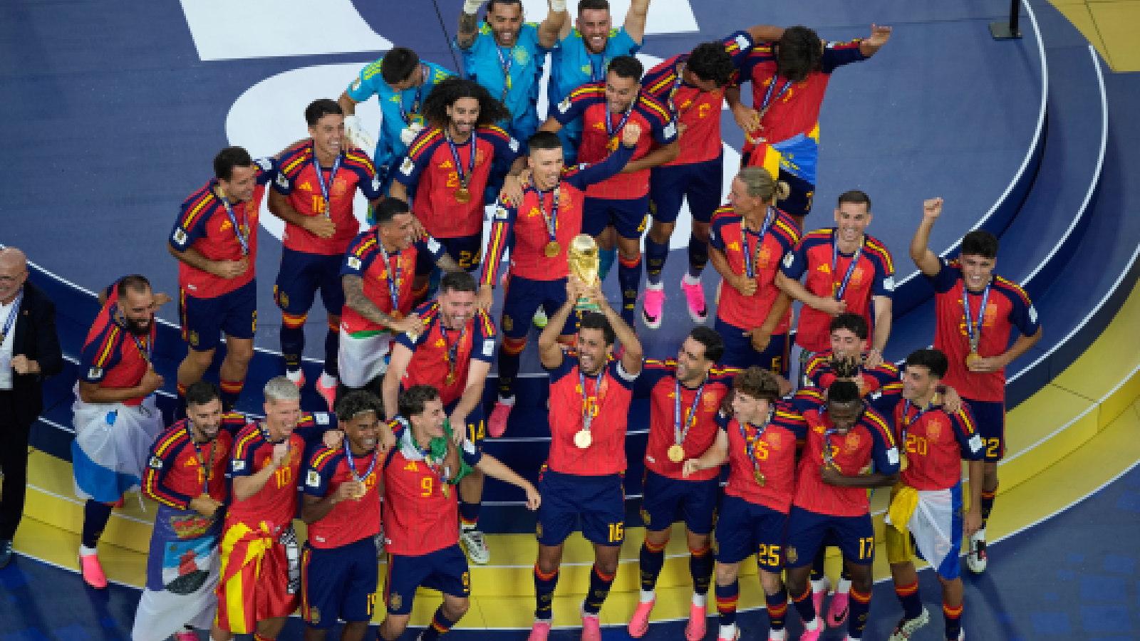 Spain players celebrate with the trophy after the World Cup final soccer match between Spain and Argentina in East Rutherford, N.J., near New York, Sunday, July 19, 2026. (AP Photo/Matt Slocum)