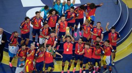 Spain 2026 WC Spain players celebrate with the trophy after the World Cup final soccer match between Spain and Argentina in East Rutherford, N.J., near New York, Sunday, July 19, 2026. (AP Photo/Matt Slocum)