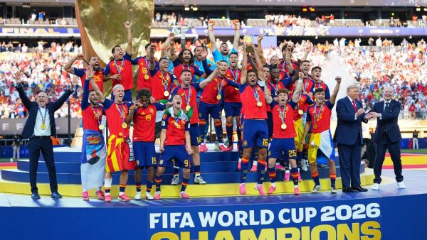 Spain celebrates with the trophy after the World Cup final soccer match between Spain and Argentina in East Rutherford
