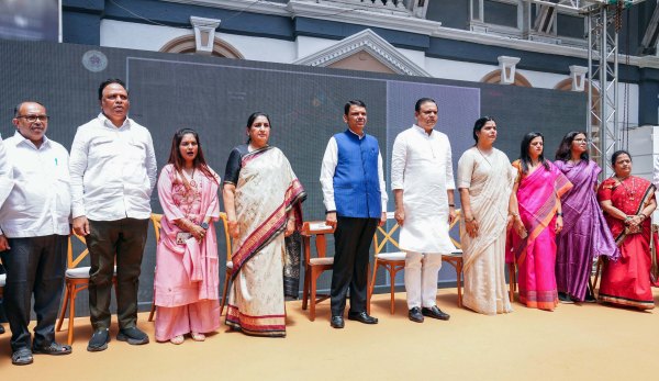 Maharashtra Chief Minister Devendra Fadnavis during the inauguration ceremony of beautification and illumination works of 'Kala Ghoda Art Avenue', in Mumbai on Tuesday. State Deputy Chief Minister Sunetra Pawar also present. (@CMOMaharashtra X/ANI Photo)