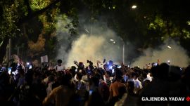Tear gas is used on protesters during the CJP protest at Parliament Street in New Delhi. (Express Photo by Gajendra Yadav)
