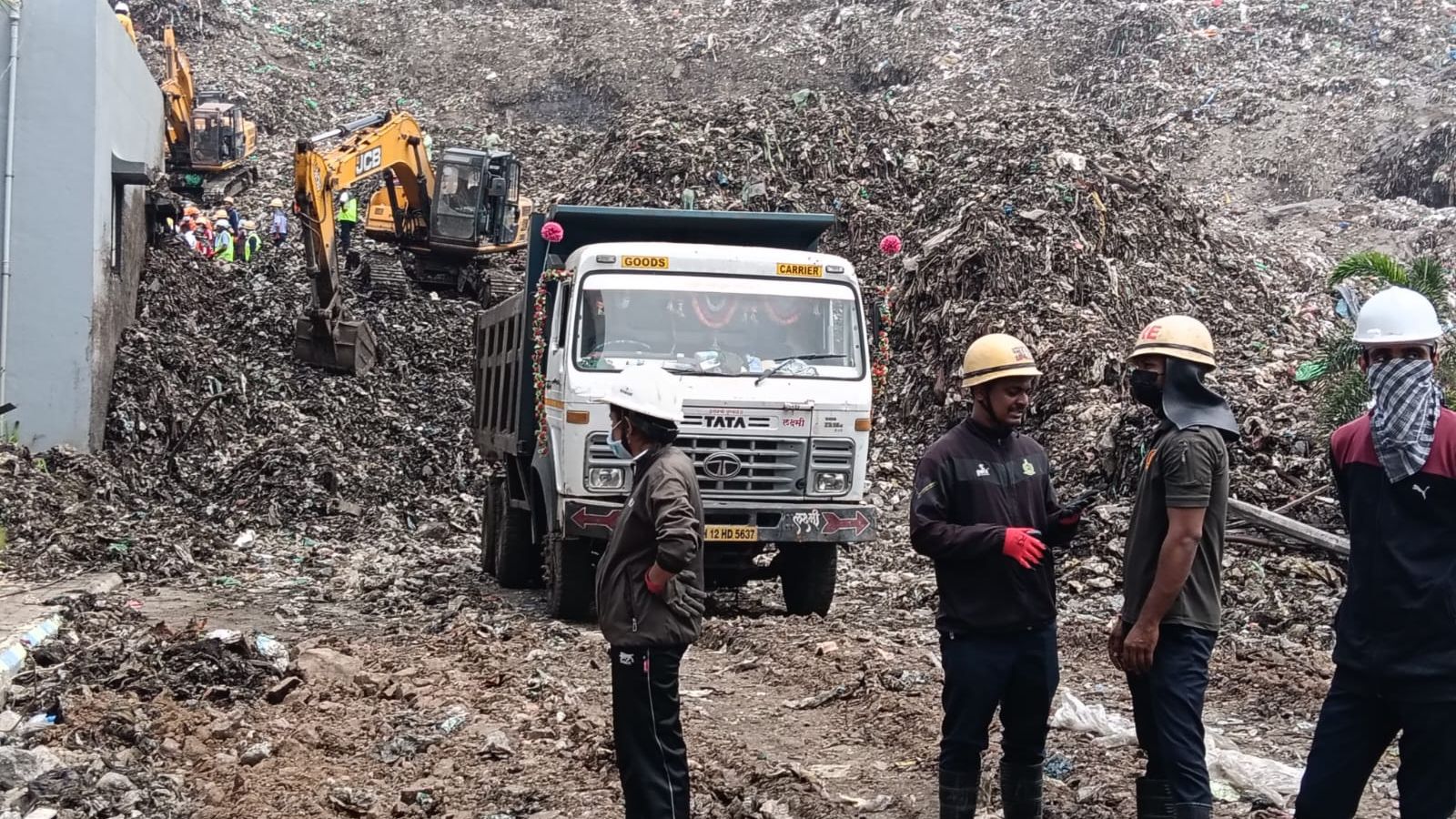 Live: Race against time to rescue 8 missing as waste mountain brings down building in Pune