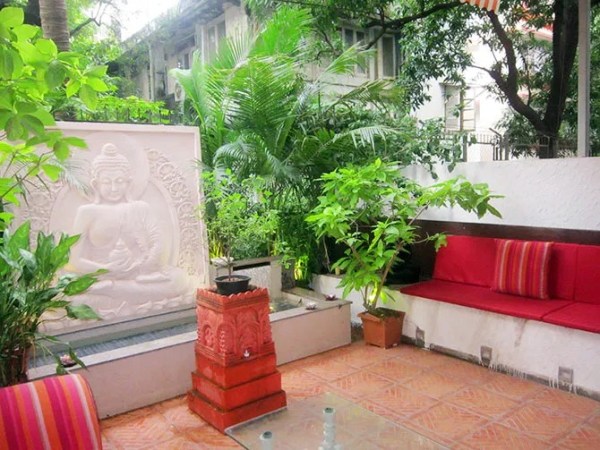 One of the balconies are converted into a seating area.