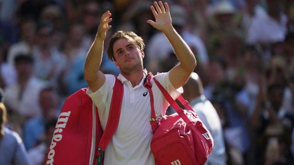 Arthur Fery of Britain waves to the audience as he leaves after winning his match against Flavio Cobolli of Italy in their quarter-final men's singles match at the Wimbledon Tennis Championships in London, Wednesday, July 8, 2026. (AP Photo/Brian Inganga)