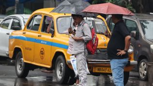 Kolkata is currently under heavy rainfall warnings as an intense monsoon spell impacts urban areas, despite recording 0 mm of rainfall till midday on July 13. (Express photo by Partha Paul)