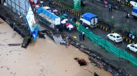 A large stretch of the road caved in on LBS Marg near Sonapur and opposite Asian Paints in Bhandup (West) (Express Photo by Akash Patil)