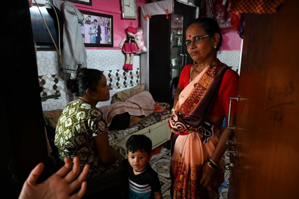 Laxmi Parab and her family are seen inside their house situated on the slope of a hillock at Vikhroli Parksite area in Mumbai on 09 July 2026. The area has been marked as a landslide-prone zone by the authorities. Express photo by Sankhadeep Banerjee. 09.07.2026.