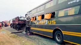 A view of the damaged bus after it collided with a trailer near Milestone 112 on the Yamuna Expressway