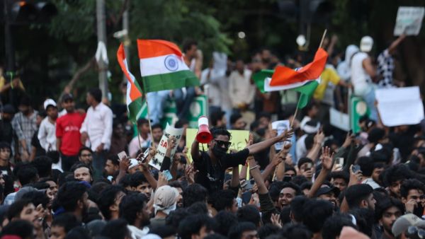 Protestors gather at Connaught Place in New Delhi on Wednesday. (Express Photo by Tashi Tobgyal)