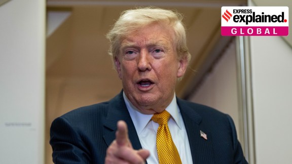 US President Donald Trump speaks with reporters in flight on Air Force One.