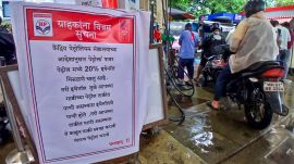 A poster placed regarding the implementation of the 20 percent ethanol blending (E20) policy in petrol, in Thane, Monday, July 6, 2026. (PTI Photo)