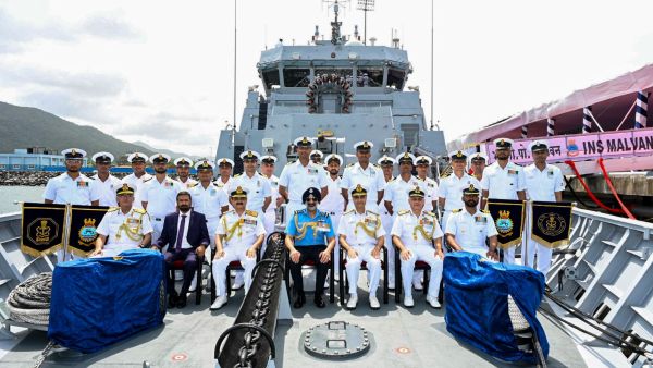 Air Chief Marshal A P Singh and Vice Admiral Sanjay Vatsayan during the commissioning of INS Malvan, an indigenously built Mahe-class Anti-Submarine Warfare Shallow Water Craft (ASW-SWC), at Karwar on Wednesday. (Photo: Defence PRO/PTI)
