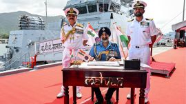 Chief of the Air Staff Air Chief Marshal A P Singh with Western Naval Command Flag Officer Commanding-in-Chief Vice Admiral Sanjay Vatsayan during the commissioning ceremony of INS Malvan, the second indigenously designed and built Mahe-class Anti-Submarine Warfare Shallow Water Craft (ASW-SWC). (Photo: Defence PRO/PTI)