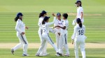 India's Kranti Gaud (second right) celebrates with her teammates after taking the wicket of England's Tammy Beaumont in the first Women's Test at Lord's Cricket Ground in London. (PA via AP)