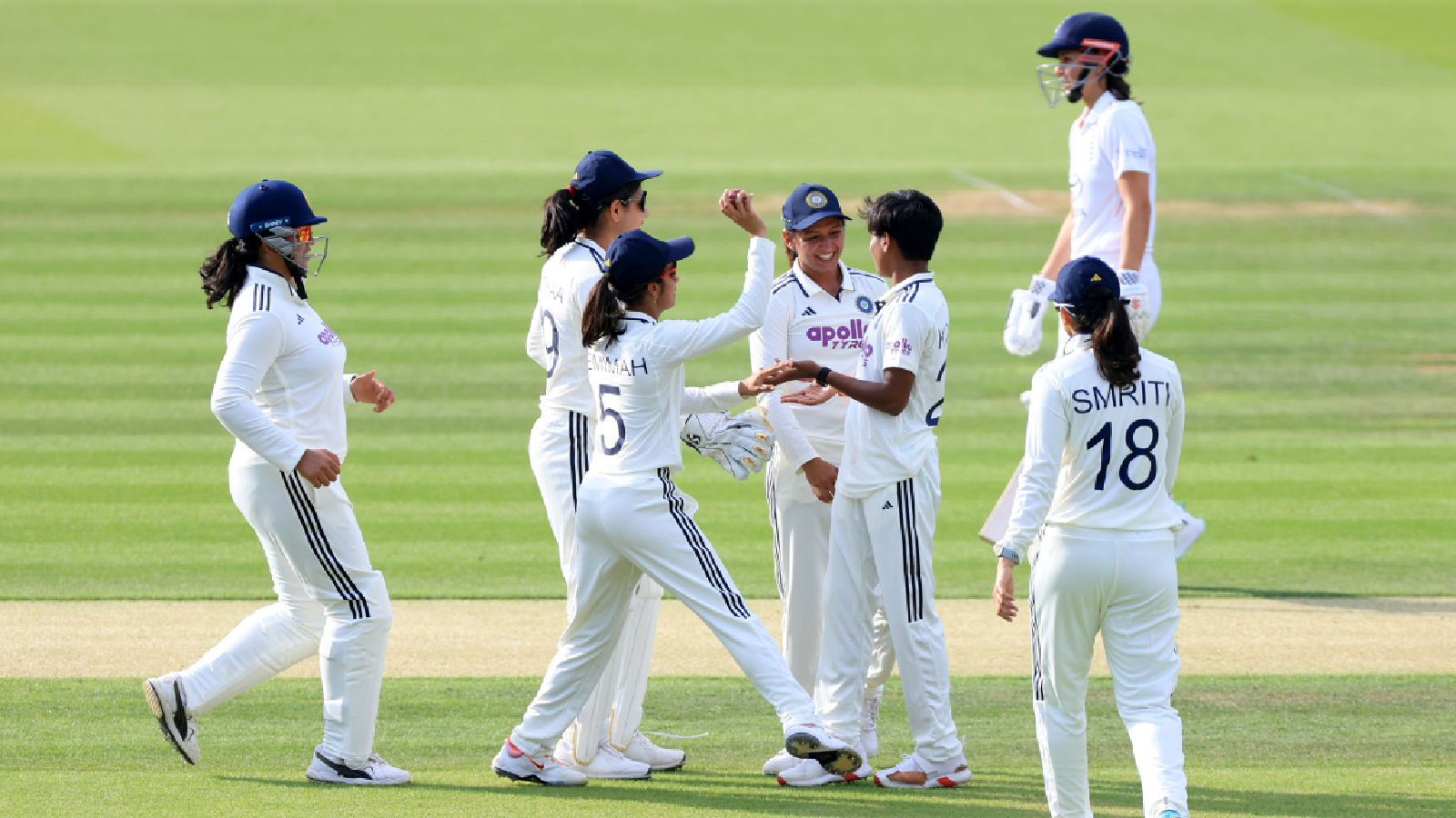India's Kranti Gaud (second right) celebrates with her teammates after taking the wicket of England's Tammy Beaumont in the first Women's Test at Lord's Cricket Ground in London. (PA via AP)