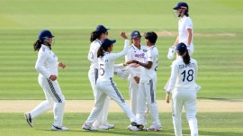 India's Kranti Gaud (second right) celebrates with her teammates after taking the wicket of England's Tammy Beaumont in the first Women's Test at Lord's Cricket Ground in London. (PA via AP)