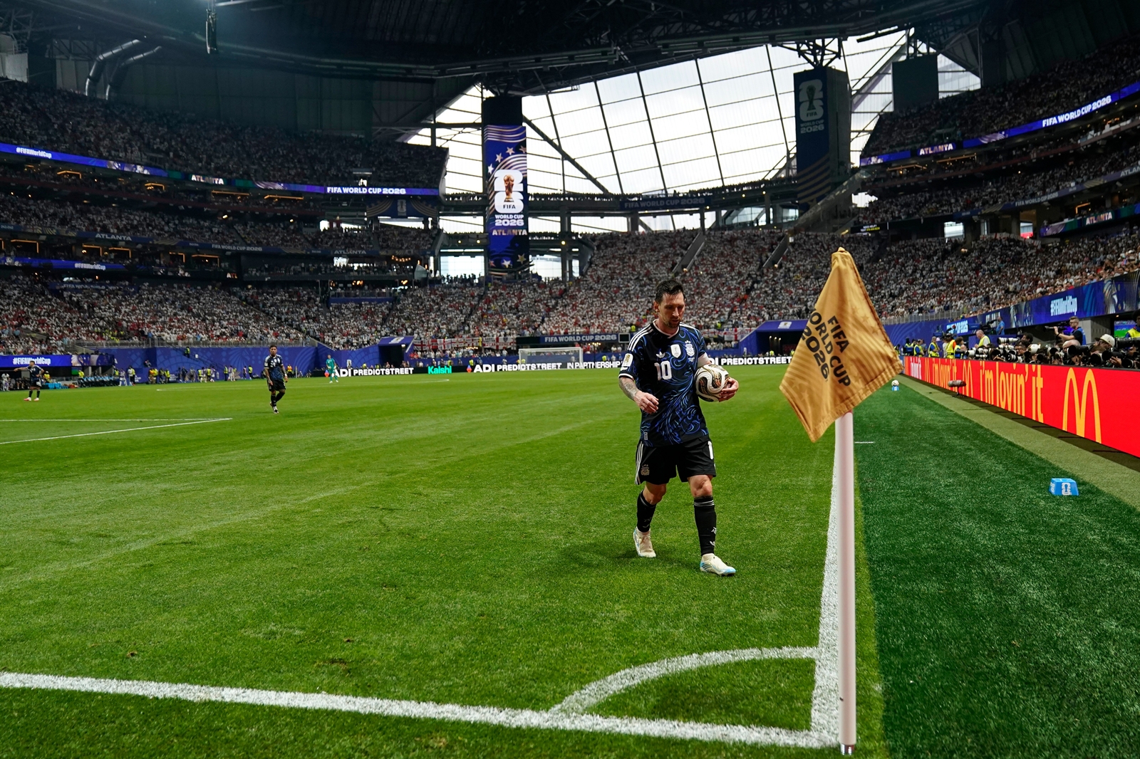 Argentina's Lionel Messi (10) walks with the ball to take a corner kick during the World Cup semifinal soccer match between England and Argentina in Atlanta, Wednesday, July 15, 2026. (AP Photo/Jacob Kupferman)