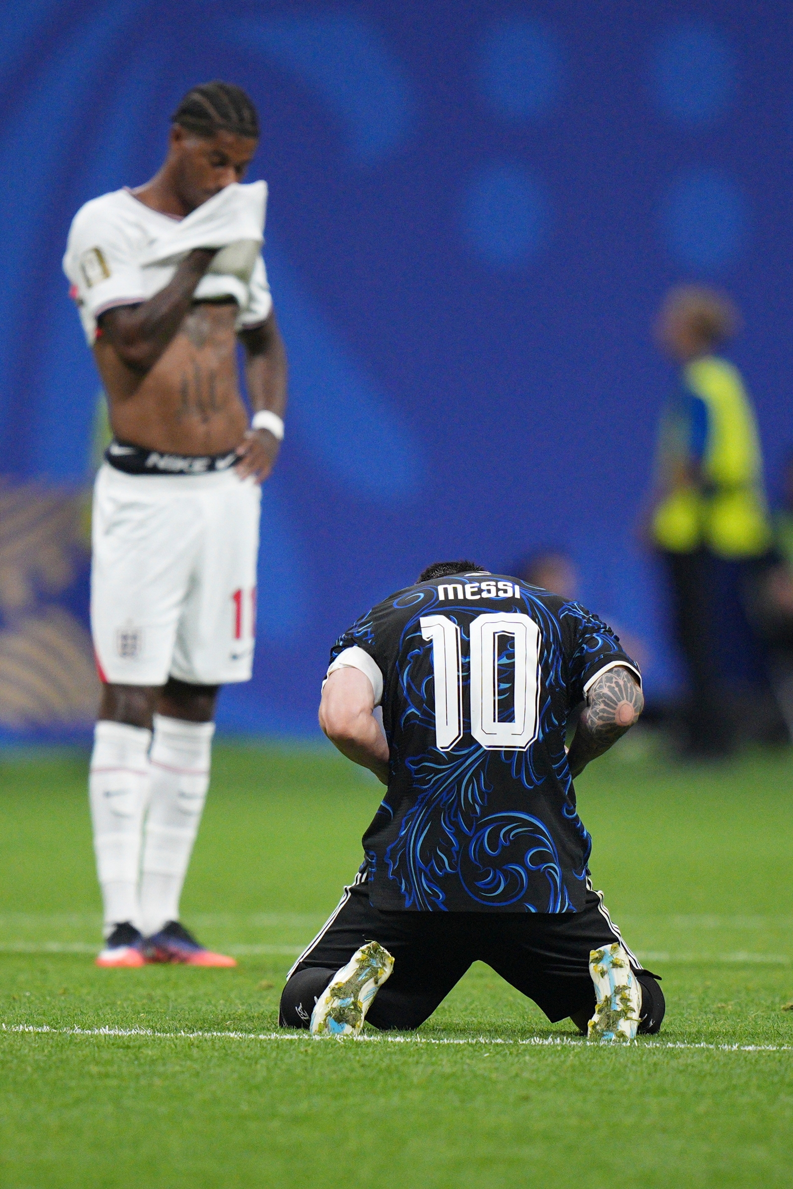 Argentina's Lionel Messi celebrates as England's Marcus Rashford looks on after the FIFA World Cup semifinal in Atlanta. (AP Photo/Jacob Kupferman)