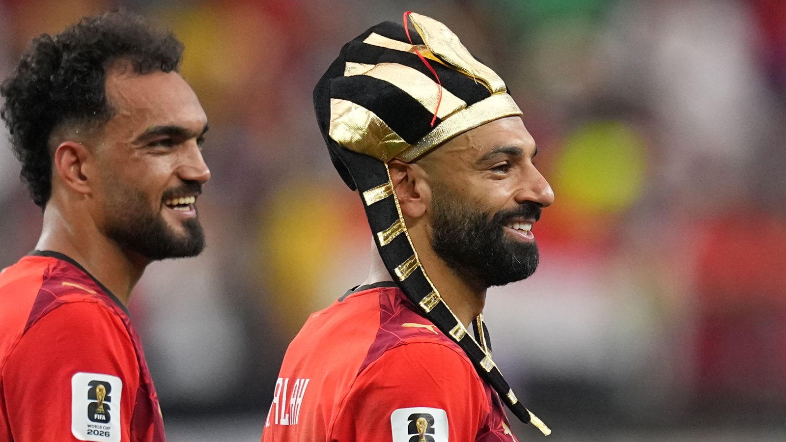 Egypt's Mohamed Salah, right, and teammate Mostafa Zico celebrate after winning a penalty shootout against Australia following a World Cup round of 32 match. (AP Photo/Julio Cortez)